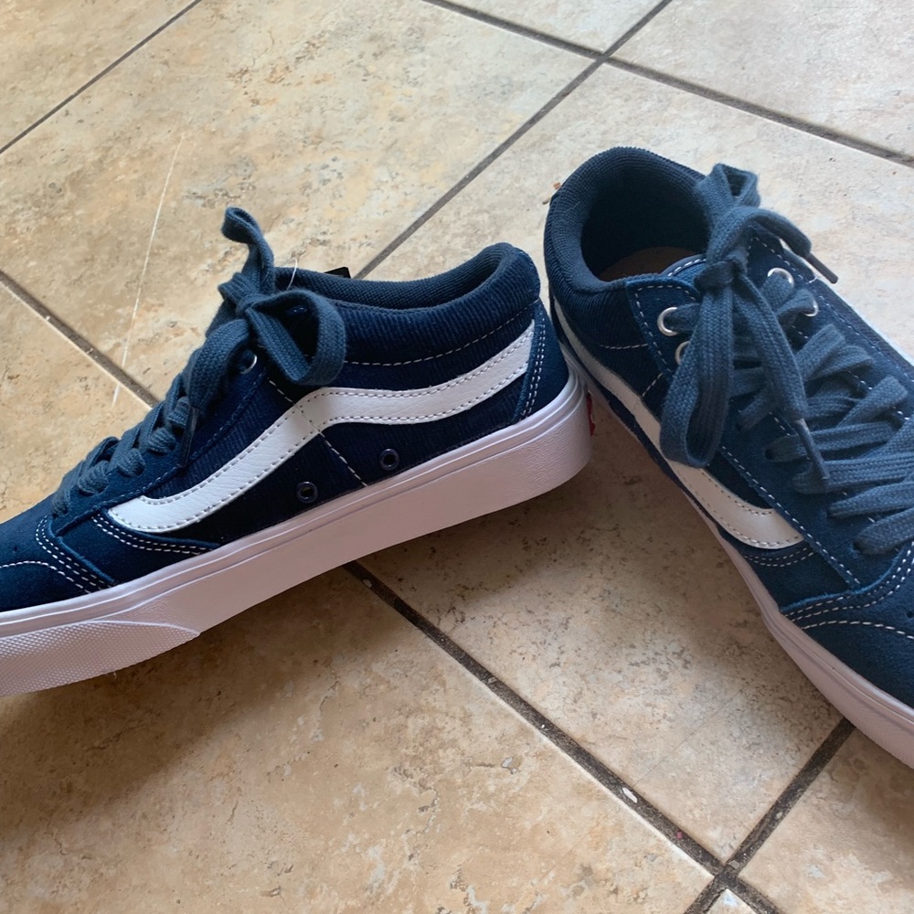 Navy blue and white vans